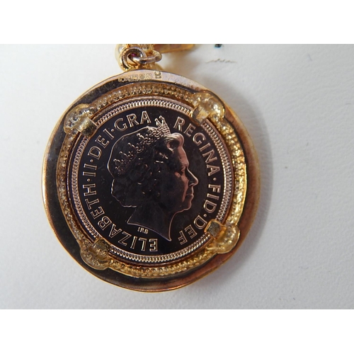 22 - 2004 Gold Half Sovereign in 9ct Gold pendant and chain cased limited edition as issued by the Royal ... 