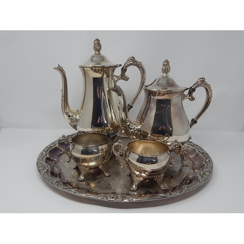 138 - Silver Plated Wares: Four Piece Tea & Coffee Set on Circular Silver Plated Tray Measuring 38.5cm dia... 