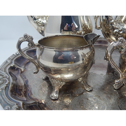 138 - Silver Plated Wares: Four Piece Tea & Coffee Set on Circular Silver Plated Tray Measuring 38.5cm dia... 