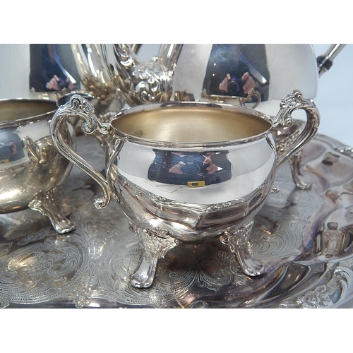 138 - Silver Plated Wares: Four Piece Tea & Coffee Set on Circular Silver Plated Tray Measuring 38.5cm dia... 