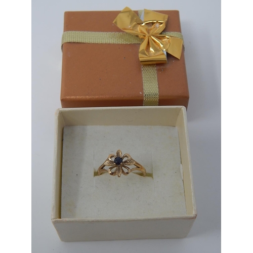 141 - 9ct Gold Fully Hallmarked Ring Set with a Central Sapphire: Size N: Weight 2.2g