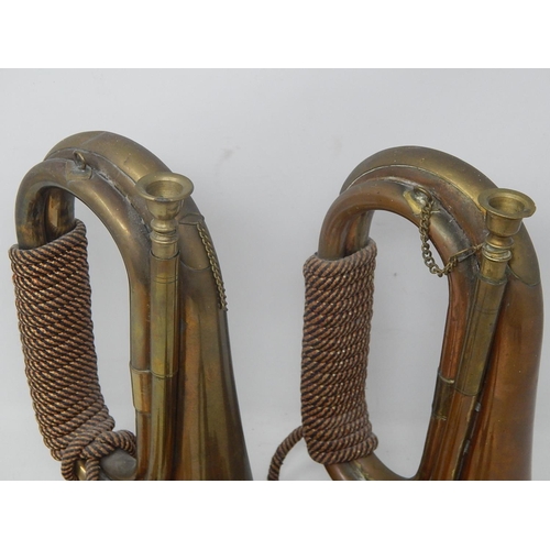 54 - Military: Pair of Brass & Copper Regimental Bugles together with a similar small bugle.