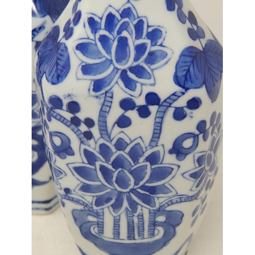 98 - Pair of Chinese Blue & White Vases: Marks to bases: Height 23cm.