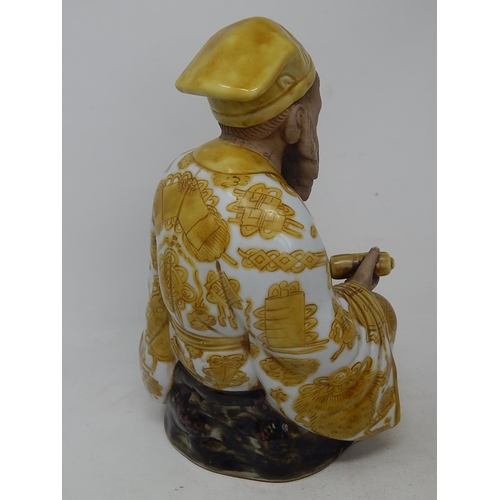 124 - Large Japanese Yellow Glazed Figure with Matt Features: Impressed Seal Mark to Base: Measures 27cm h... 