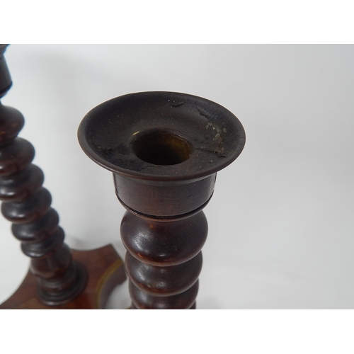 130 - Pair of Georgian Barley Twist Candlesticks: Measuring 33cm high.