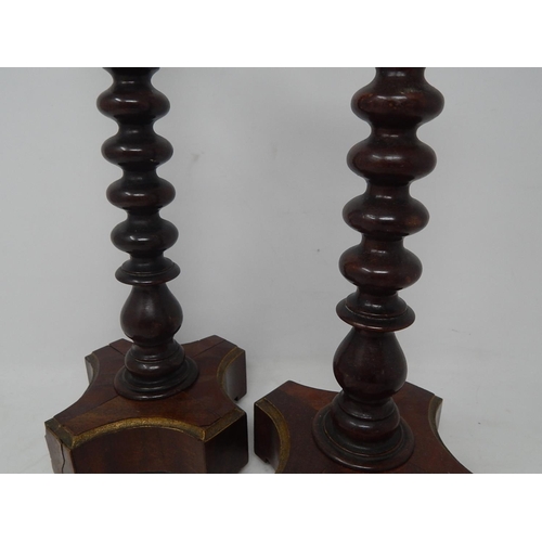 130 - Pair of Georgian Barley Twist Candlesticks: Measuring 33cm high.