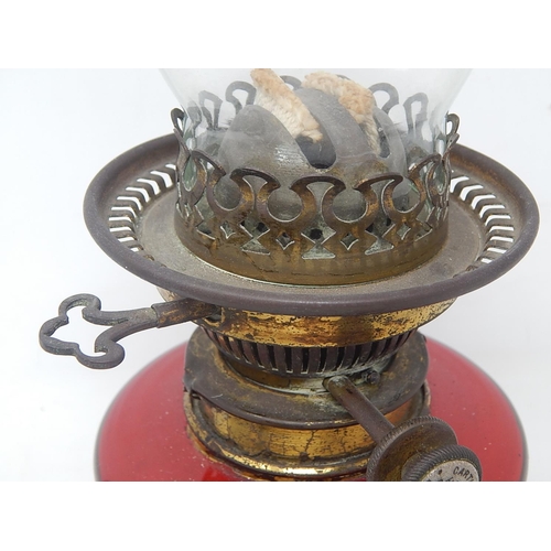 132 - Victorian Cranberry Glass Oil Lamp with HINKS Burner & Glass Funnel. Measures 42cm high