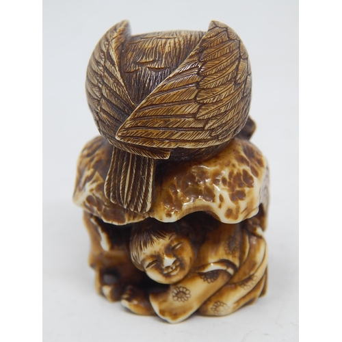 154 - Japanese Signed Netsuke of an Eagle atop a Rock with Man Hiding Below: Edo/Meiji Period: Measures 4.... 