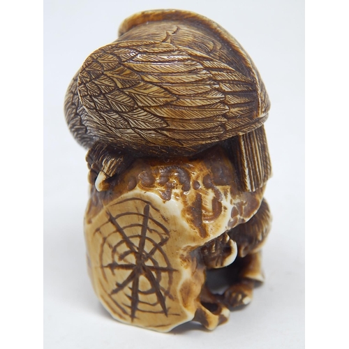 154 - Japanese Signed Netsuke of an Eagle atop a Rock with Man Hiding Below: Edo/Meiji Period: Measures 4.... 