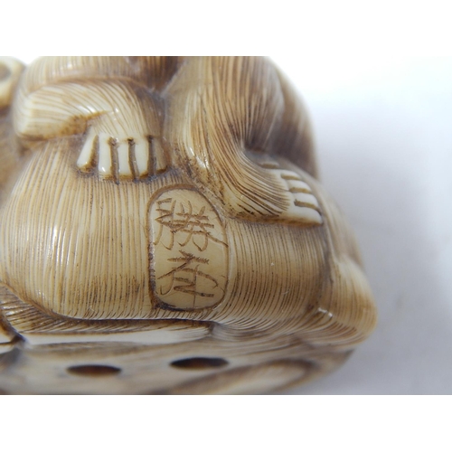 156 - Japanese Signed Netsuke of a Wild Boar with a Monkey on its back: Edo/Meiji Period: Measures 4.3cm w... 