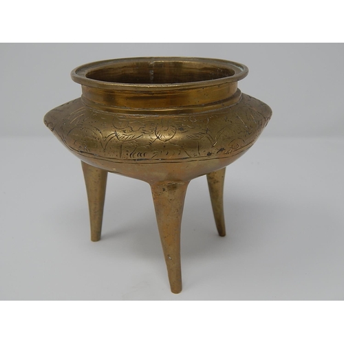 169 - Chinese Bronze Incense Burner Standing on three legs with character marks to base: Measures 10cm hig... 