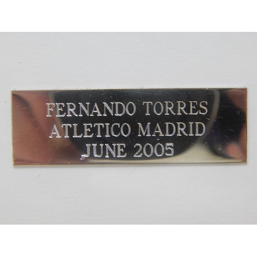 171 - FERNANDO TORRES: Atletico Madrid June 2005 Signed Captains Armband with Photograph: Measures 35cm x ... 