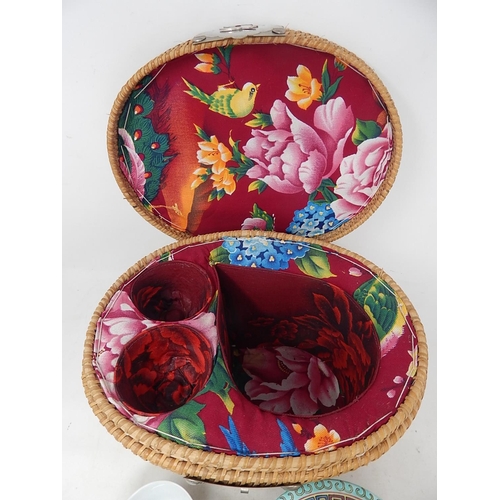 173 - Chinese Tea Pot & Tea Bowls contained within their fitted silk lined wicker basket. Tea Pot 15cm hig... 