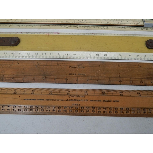 177 - Group of Rulers to Include a slide rule by Faber & Castell.