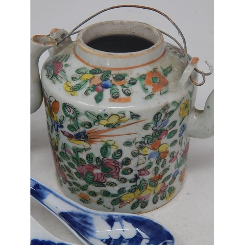 181 - Two Enamelled Japanese Teapots together with two rice spoons & a circular cast metal stand with char... 