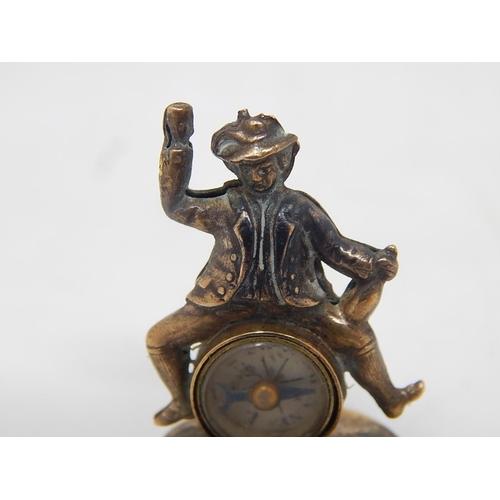 182 - Late 19th Century Continental Agate Seal formed as a drunken man with Compass. Measures 3cm high