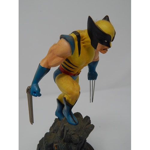 185 - Marvel Comics 2001 Wolverine Statue 767/3500 by Sculptor Carl Surgess: Measures 17.5cm high.