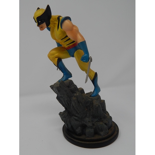 185 - Marvel Comics 2001 Wolverine Statue 767/3500 by Sculptor Carl Surgess: Measures 17.5cm high.