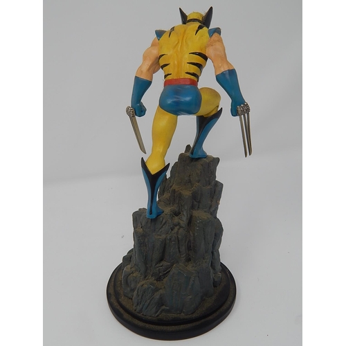 185 - Marvel Comics 2001 Wolverine Statue 767/3500 by Sculptor Carl Surgess: Measures 17.5cm high.