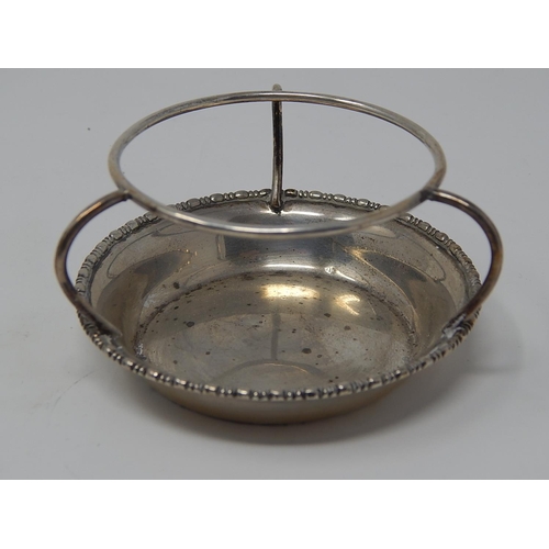 3 - Silver Tea Strainer & Stand: Hallmarked London 1927 by Mappin & Webb: Measures 15cm long.