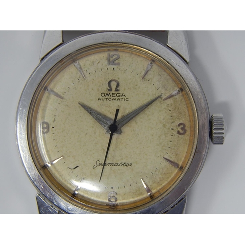 7 - Gentleman's Omega Automatic Seamaster Wristwatch 1954: Stainless Steel Case with original Dauphine H... 