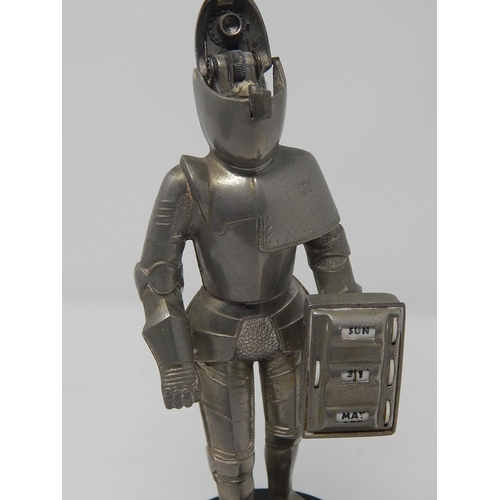 402 - Two Vintage Novelty Table Lighters: One Formed as a Knight with retractable helmet, calendar & a win... 