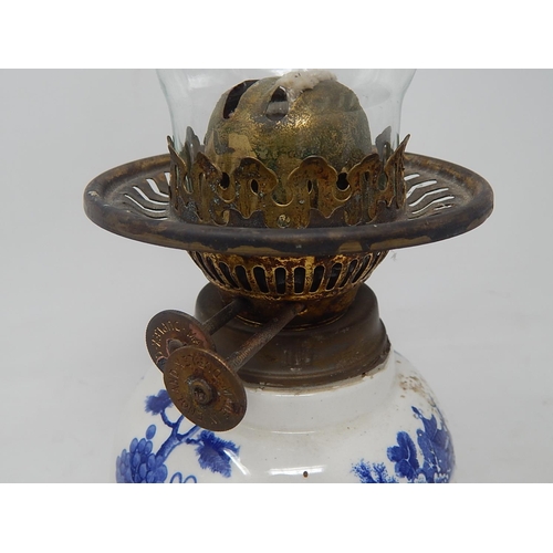 419 - Royal Cauldon Willow Pattern Ceramic Oil Lamp with Duplex Burner & Glass Funnel. Measures 42cm high