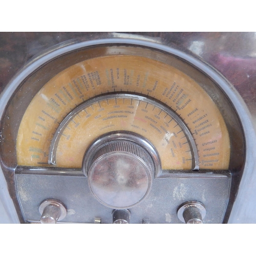 471 - 1930's Brown Bakelite Radio together with original instructions from Radio Rentals. Measures 46cm x ... 