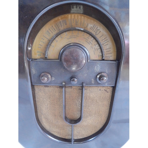 471 - 1930's Brown Bakelite Radio together with original instructions from Radio Rentals. Measures 46cm x ... 