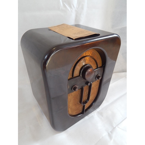 471 - 1930's Brown Bakelite Radio together with original instructions from Radio Rentals. Measures 46cm x ... 