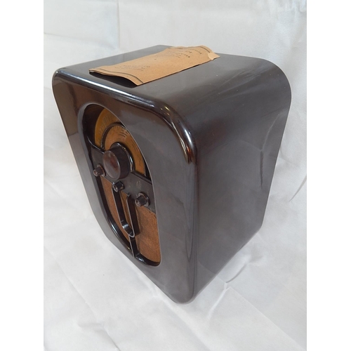 471 - 1930's Brown Bakelite Radio together with original instructions from Radio Rentals. Measures 46cm x ... 