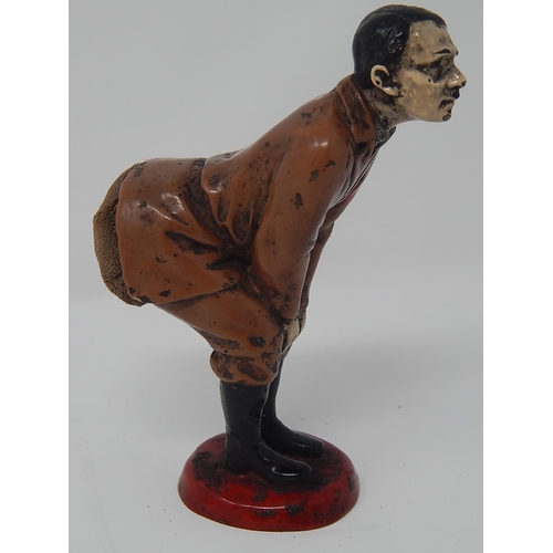 512 - WWII: A novelty Adolf Hitler cold painted bronze figural pin cushion, realistically modelled bent-ov... 