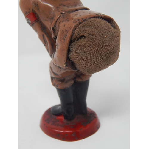 512 - WWII: A novelty Adolf Hitler cold painted bronze figural pin cushion, realistically modelled bent-ov... 