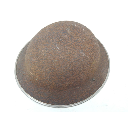 516 - WWII Birtish Tommy Helmet Shell.