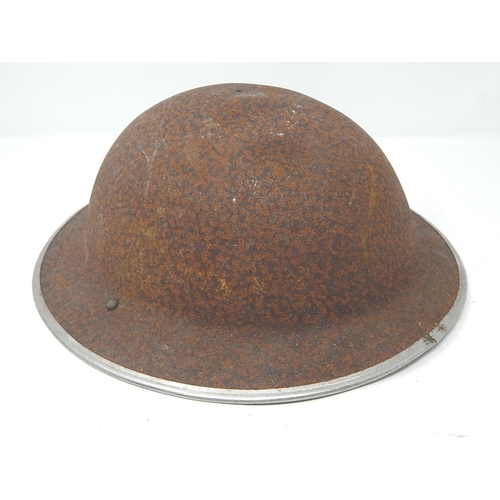 516 - WWII Birtish Tommy Helmet Shell.