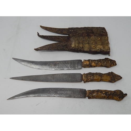 519 - C19th Sudanese Triple Dagger Set with Crocodile Sheath & Grips. The Outer Two Daggers with Curved Bl... 