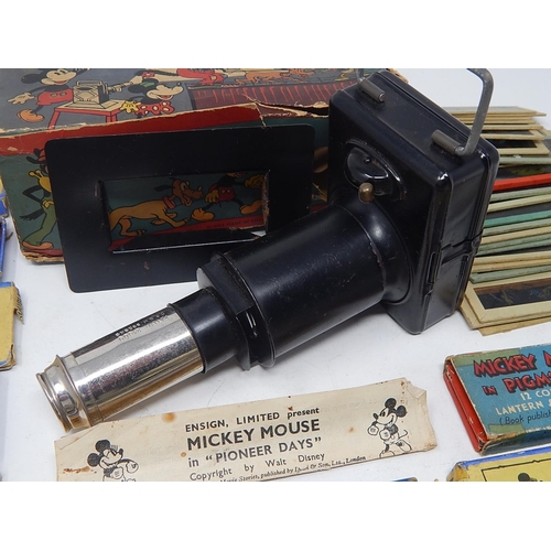 480 - 1930's MICKEY MOUSE Toy Lantern together with numerous glass coloured slides. Complete with original... 