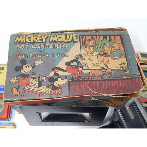 480 - 1930's MICKEY MOUSE Toy Lantern together with numerous glass coloured slides. Complete with original... 