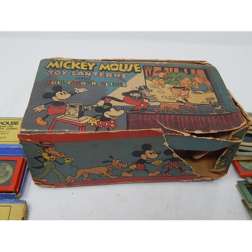 480 - 1930's MICKEY MOUSE Toy Lantern together with numerous glass coloured slides. Complete with original... 