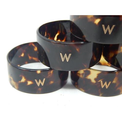 34 - Six Tortoiseshell Napkin Rings Inlaid with Gold Letter 