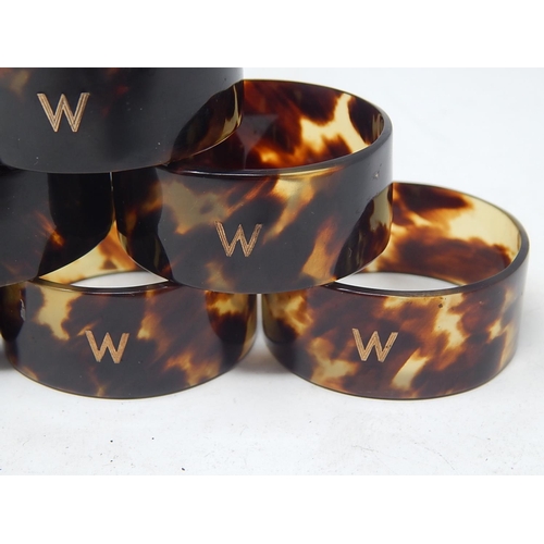 34 - Six Tortoiseshell Napkin Rings Inlaid with Gold Letter 