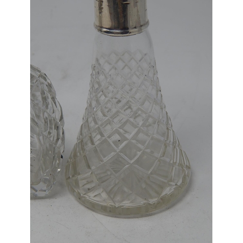 35 - Two Silver Mounted Glass Scent Bottles with Stoppers: Measuring 19.5cm / 17cm.