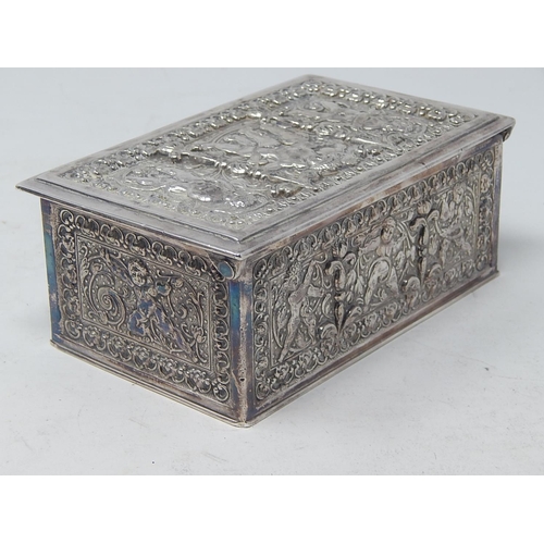 39 - Heavy Silver Plated Box Depicting Putti & Cherubs: Measuring 16cm x 10cm x 6.5cm.