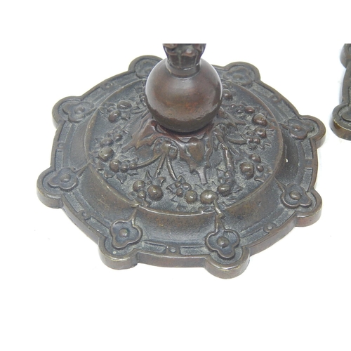 400 - Pair of Late C19th Bronze Candlesticks: Each with Three Putti on Shaped Bases: Height 16cm