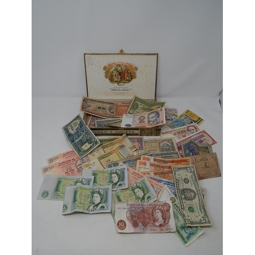 17 - A cigar box full of GB and World Banknotes