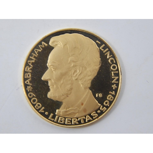 100E - Abraham Lincoln Libertas – Vacatio Aequum Concordare – .900 gold medallion – 3.4g