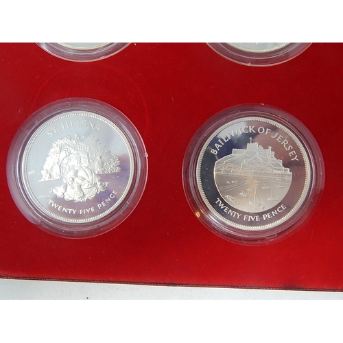 69 - A collection of 8 x 1977 Silver Proof Crowns in case; collectors album containing a selection of coi... 