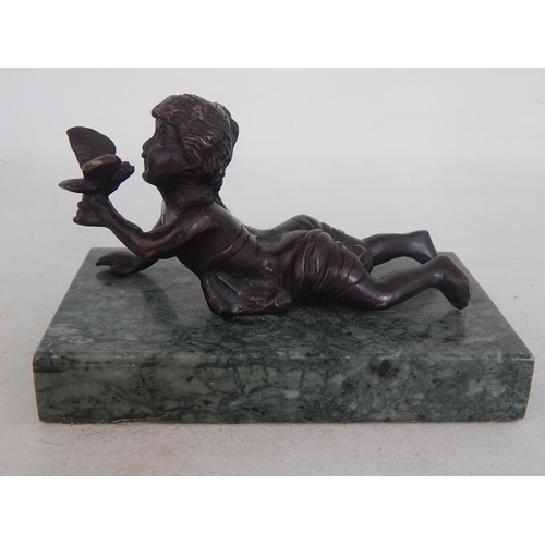 487 - A Cast Bronze Sculpture of a Cherub Holding a Bird on Marble Plinth: Measures 13cm wide overall