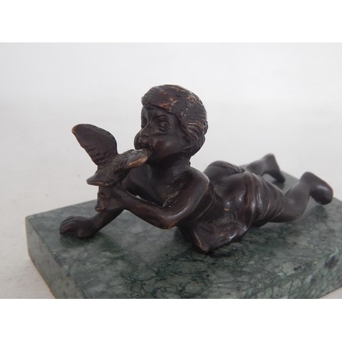 487 - A Cast Bronze Sculpture of a Cherub Holding a Bird on Marble Plinth: Measures 13cm wide overall