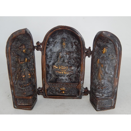 488 - A Chinese Bronze Triptych Shrine with character marks to the doors: Measures 13.5cm high